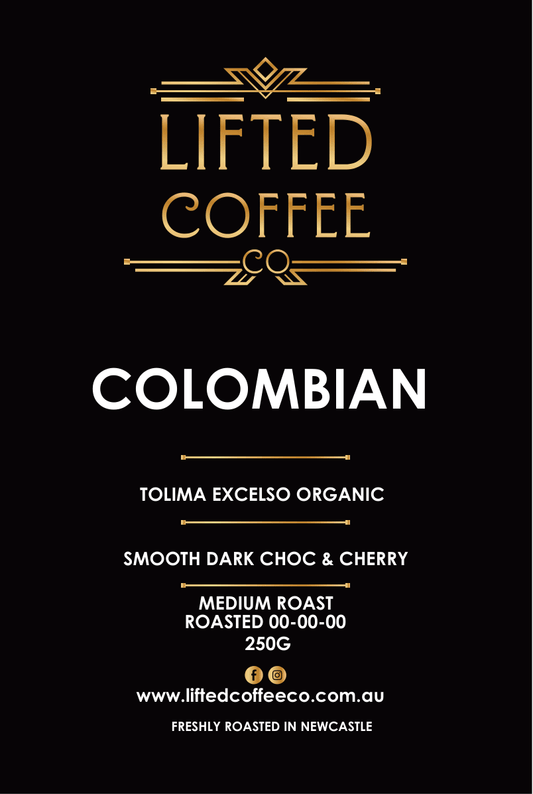 Lifted Coffee Co Colombian coffee package with gold and white text on a black background